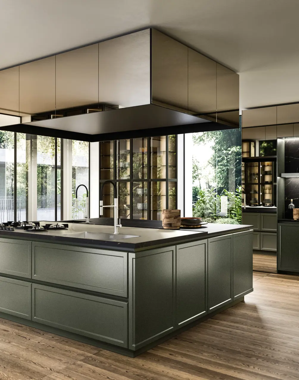 Modern kitchen with a large green island, double sink, and a black ceiling hood; ample natural light from expansive windows showing greenery outside.