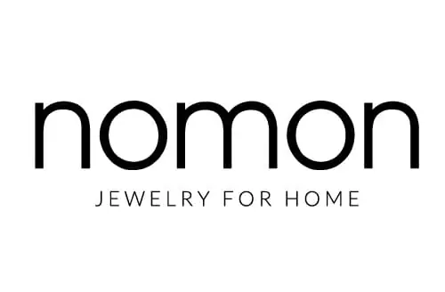 Nomon logo with the brand name in black and the subtitle 'JEWELRY FOR HOME'
